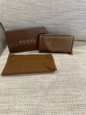 Gucci Microguccissima Patent Leather Zip Around Wallet In Bronze